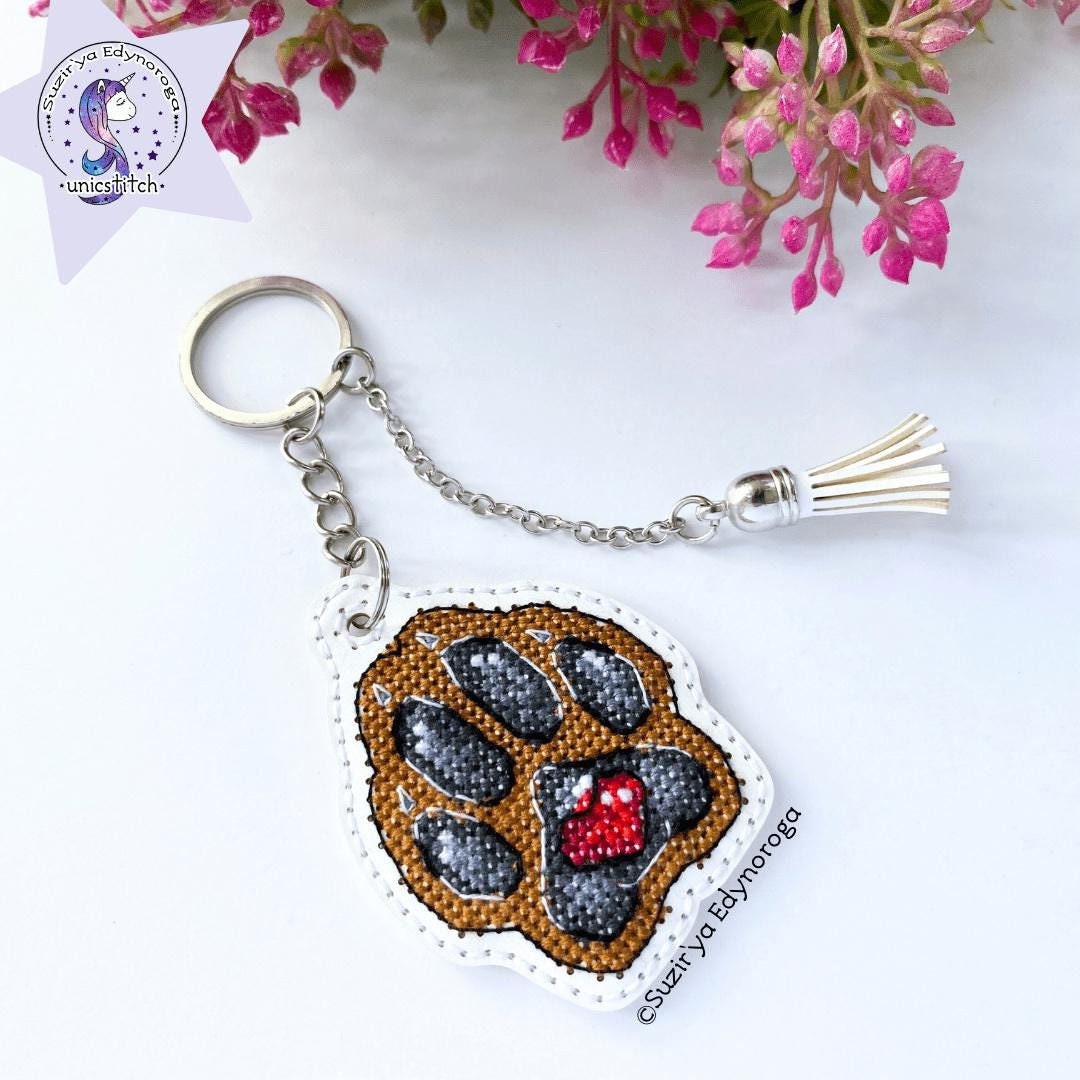 Embroidery kit Brown dog paw on white (1096), threads on flexible base