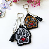 White dog paw on black Embroidery Kit: DIY Keychain, Leatherette Base