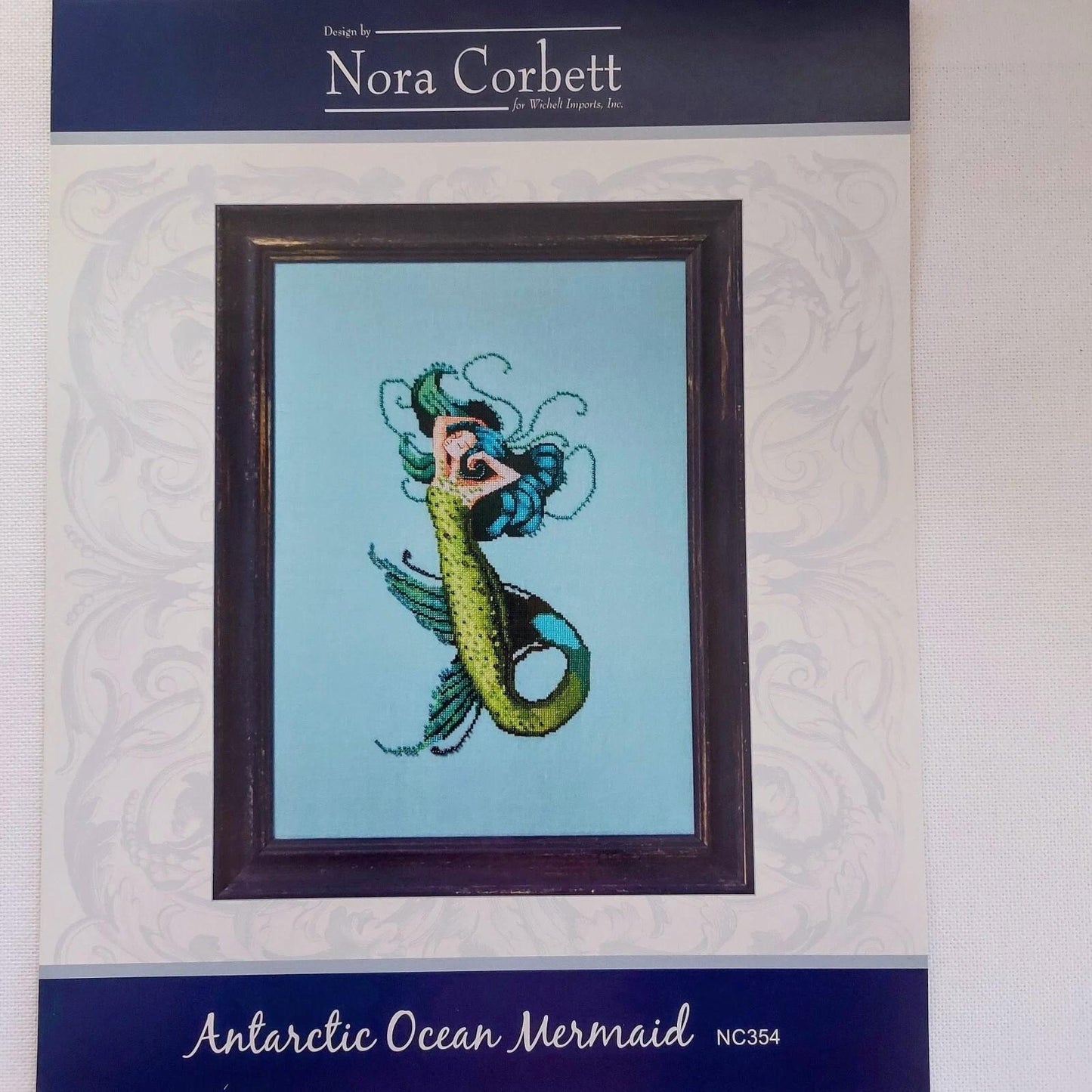 Seven Seas Mermaids - Antarctic Ocean Mermaid Cross Stitch Chart Pattern by Nora Corbett NC354